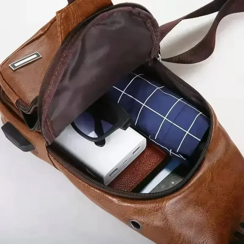 Bolsa Transversal Masculina com USB e Furo para Fone – Praticidade, Estilo e Segurança no Seu Dia a Dia