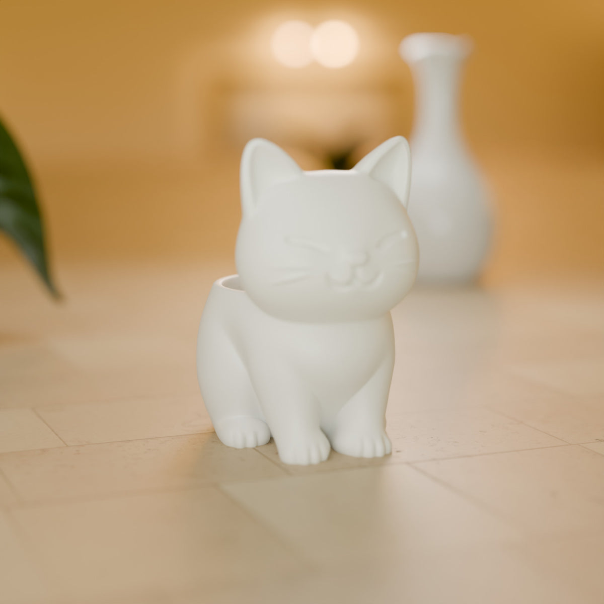 Vasinho Gatinho Sorridente para Plantas decorando o ambiente