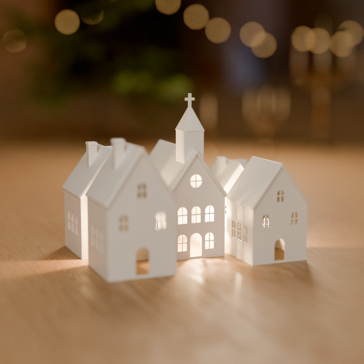 Vila de Natal com 4 Casinhas e Igrejinha para Vela LED decorando o ambiente